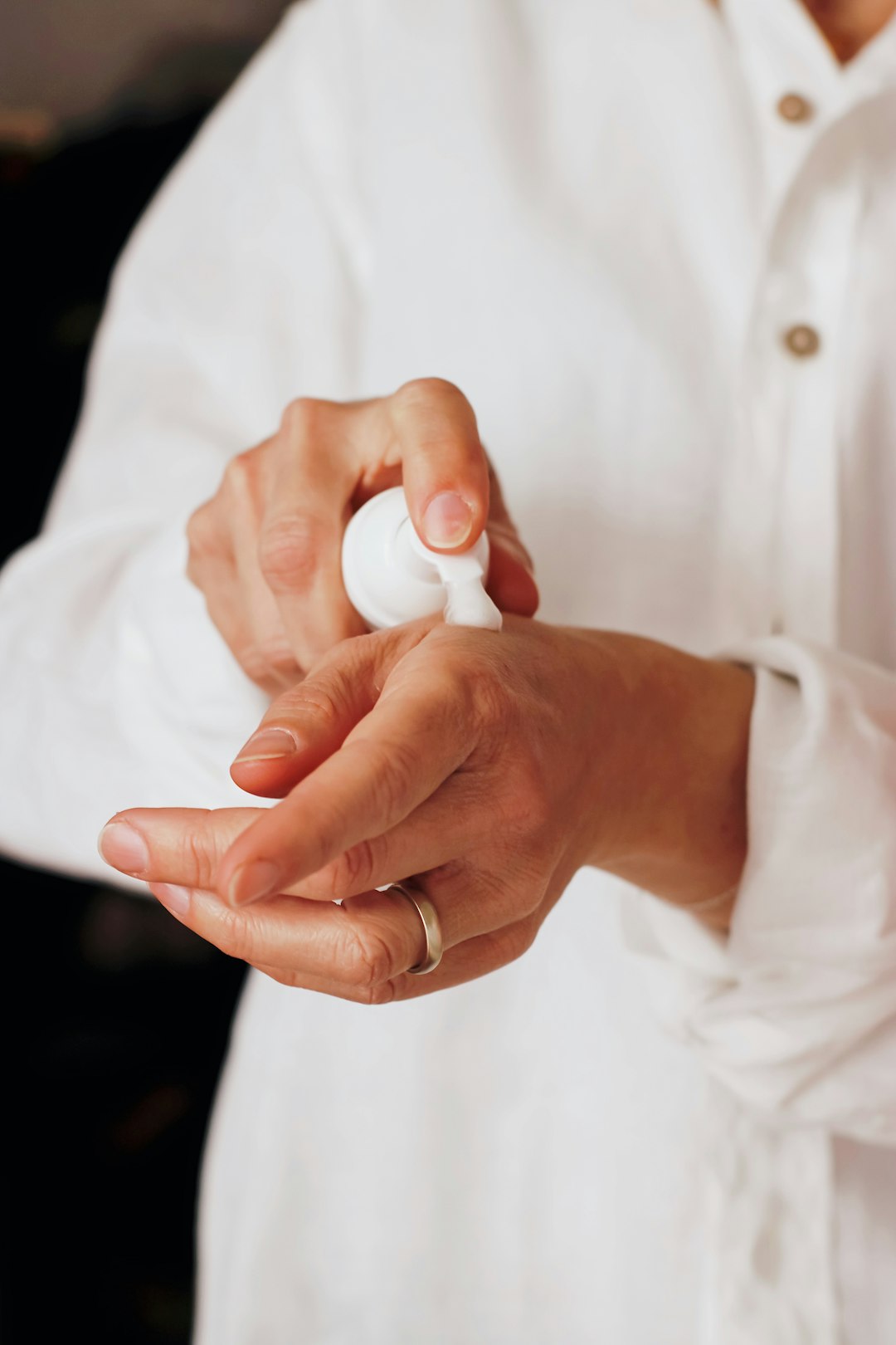 quality-assurance-01 person-holding-white-round-ornament-dfbhxjhkneo